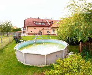 Rodinný dom (654 m2), garáž, altánok, záhrada Smižany