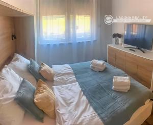 Apartmán (59 m2) s loggiou a parkovacím státím Slovenský Raj
