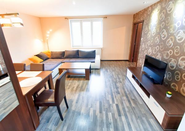 REZERVOVANÝ !Byt 3+1 (80 m2) s loggiou a záhradou, centrum SNV